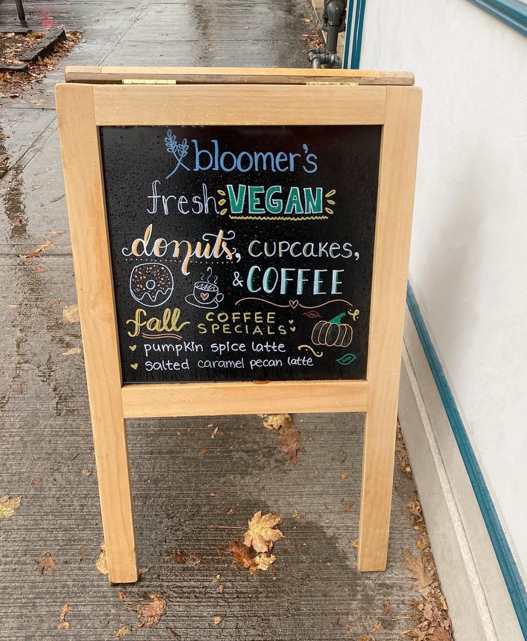 Autumn Board by a Sidewalk Café