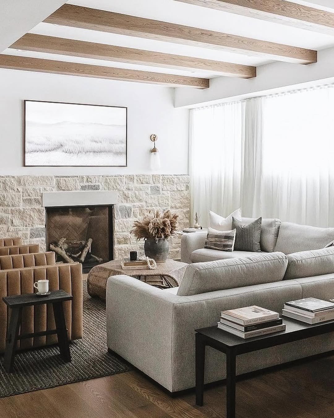 Beam Arrangement by a Stone Fireplace