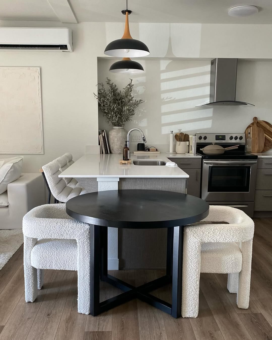 Black Table and Sculptural Pendants