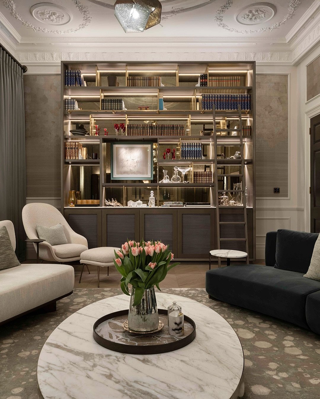 Built-In Shelving With Lighting and a Ladder