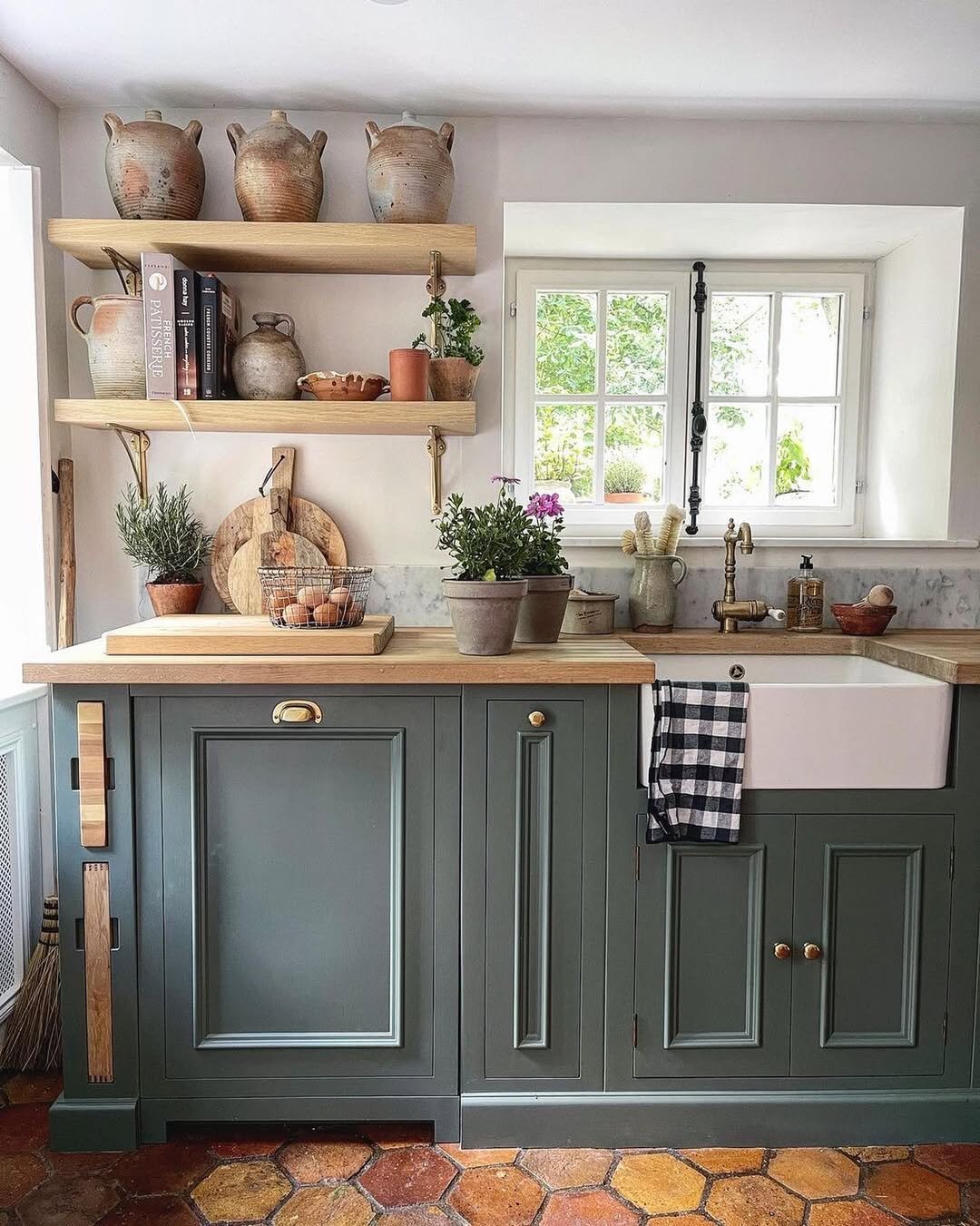 Deep Green Shaker Cabinetry and Terracotta Hex Tile Floor
