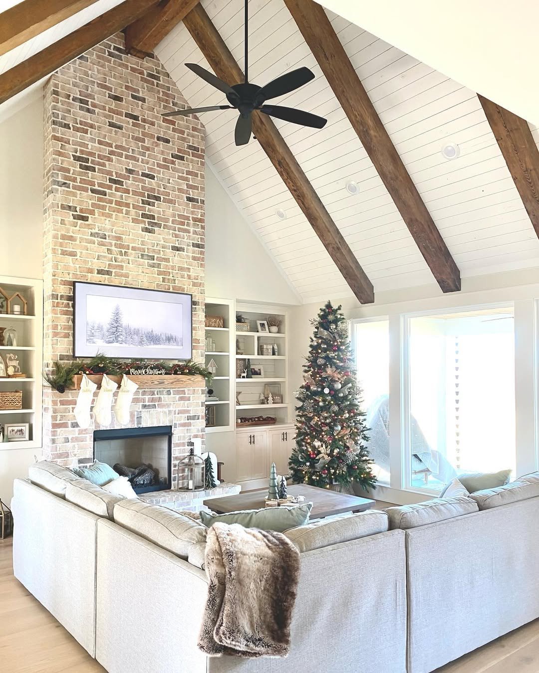 Floor-to-Ceiling Brick Chimney Breast Under a Beamed Vaulted Ceiling