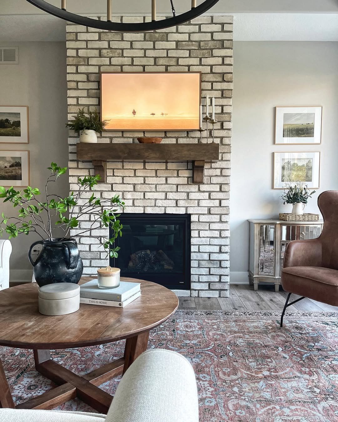 Floor to Ceiling Whitewashed Brick Fireplace