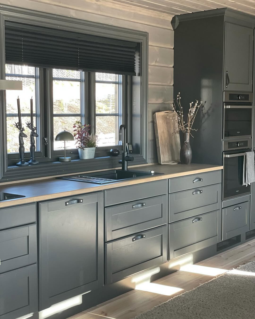 Gray Kitchen of a Log Cabin