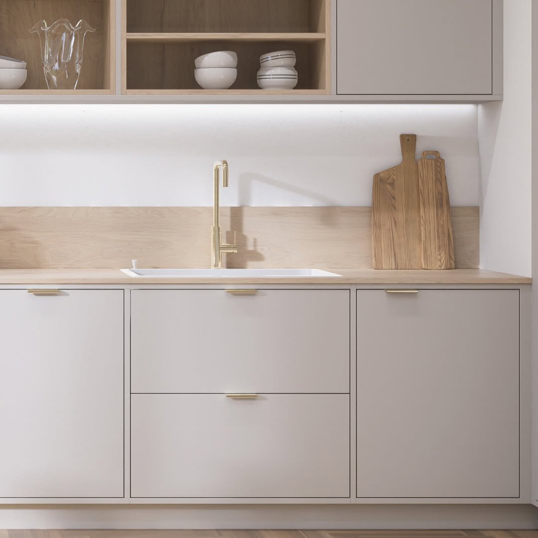 Greige Cabinets and Brass Faucet