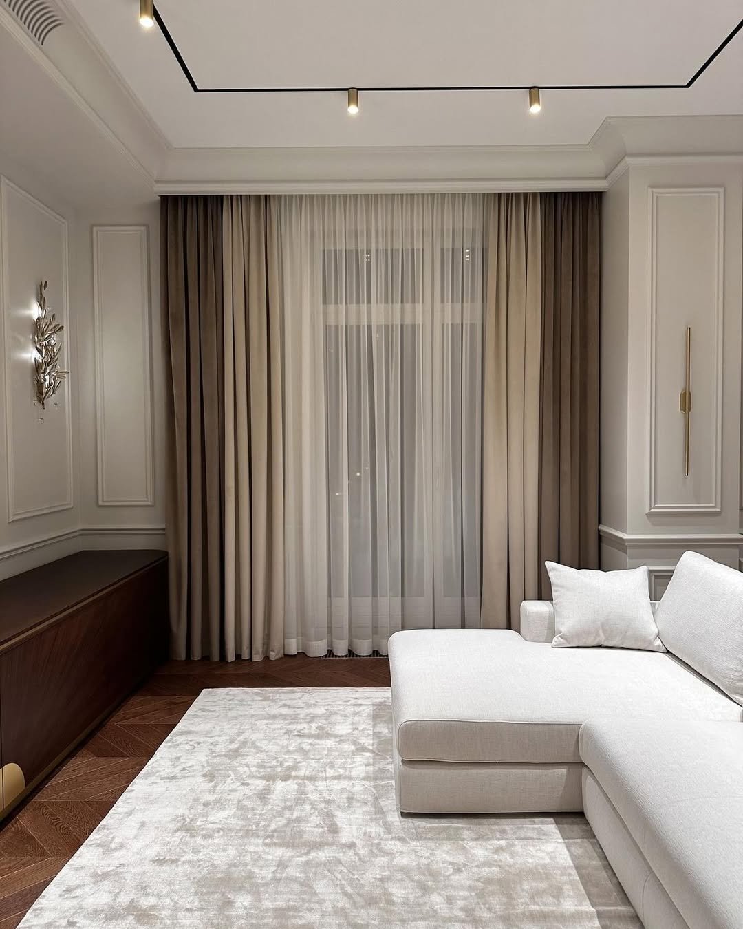 Ivory Curtains Under an Ornate Ceiling