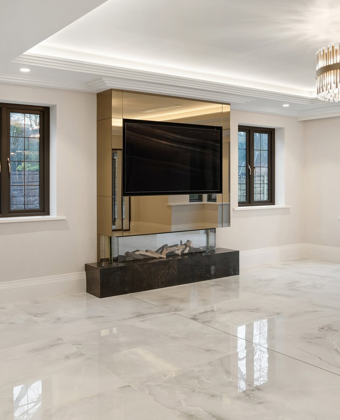 Mirrored Bronze Media Wall