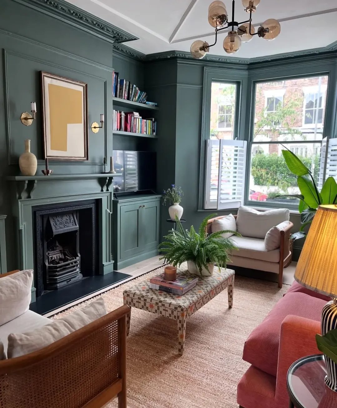 Near-Black Arched Cast-Iron Fireplace