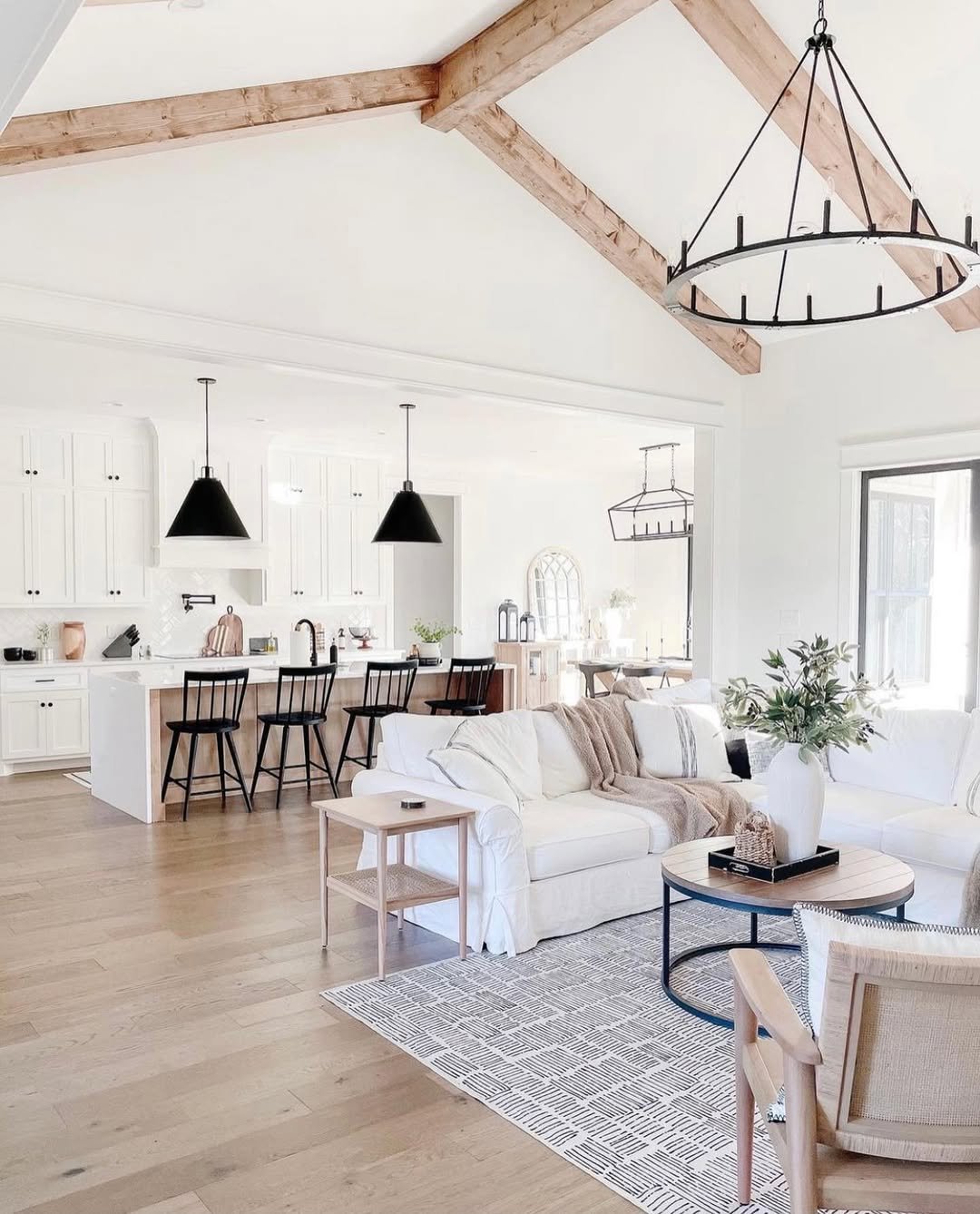 Open Plan With White Ceiling And Black Pendants