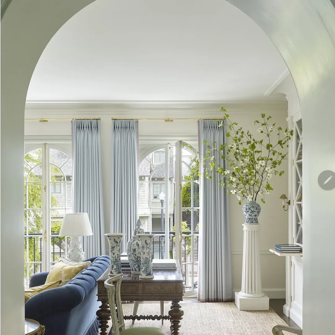 Pale Blue Curtains and Arched Window