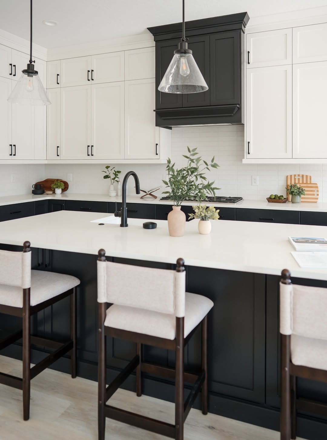 Rattan Lights in a Dark Island Kitchen