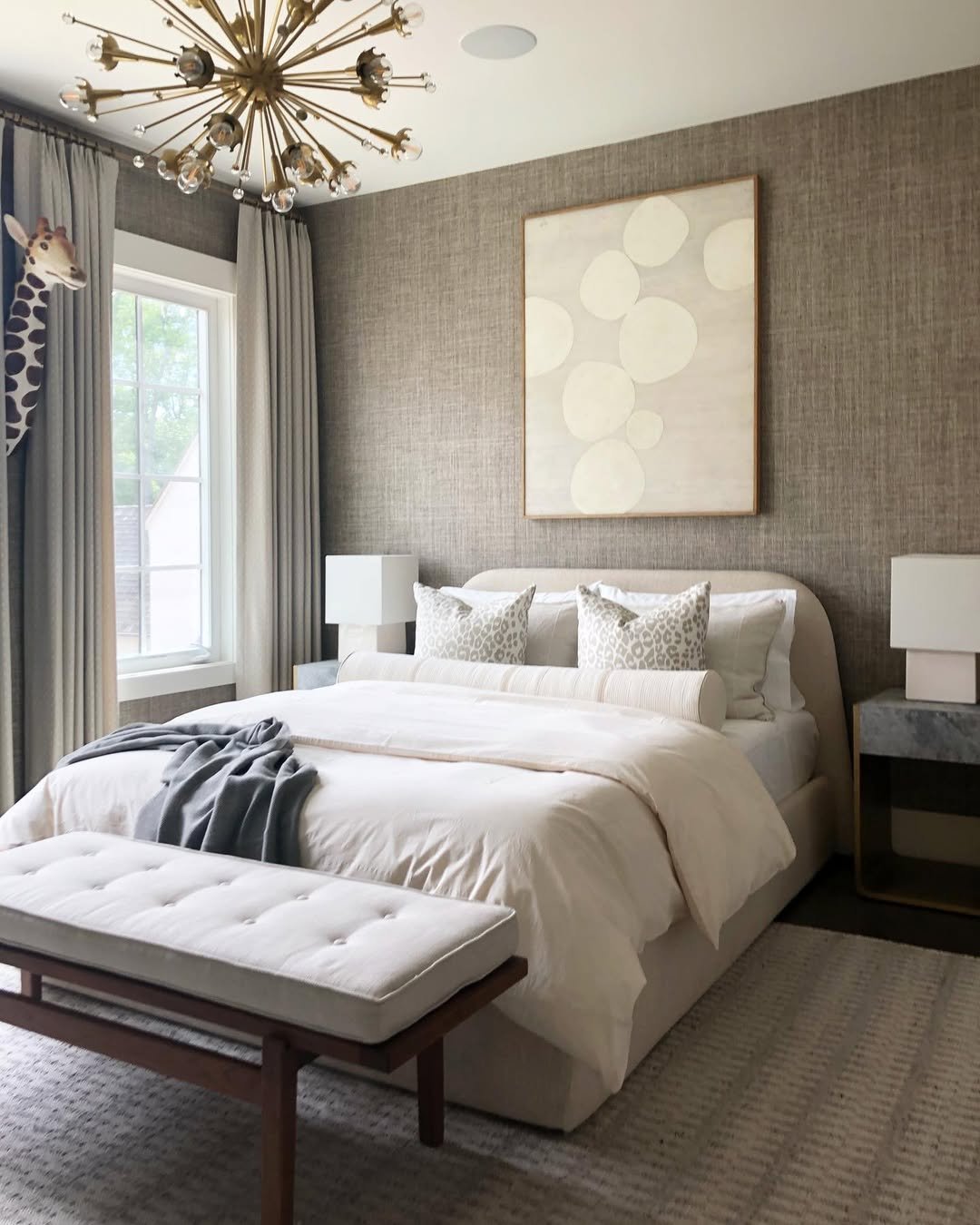 Taupe Grasscloth Guest Room With Curved Headboard