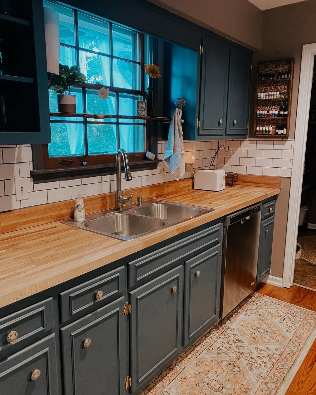 Teal Kitchen With Wood Counters