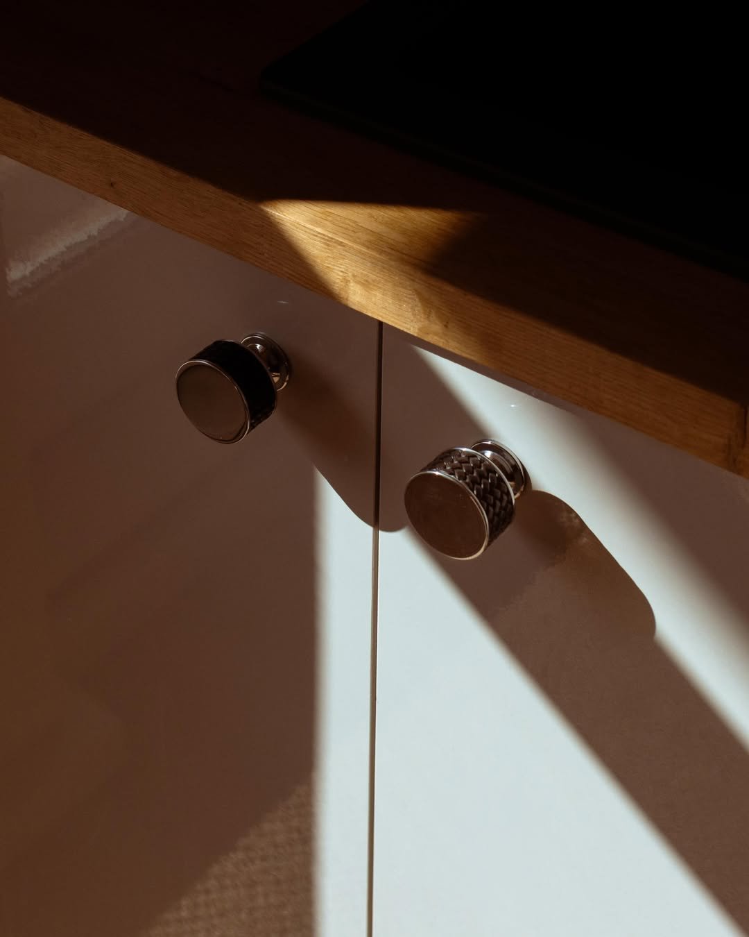 Two Chrome Knobs in Afternoon Light