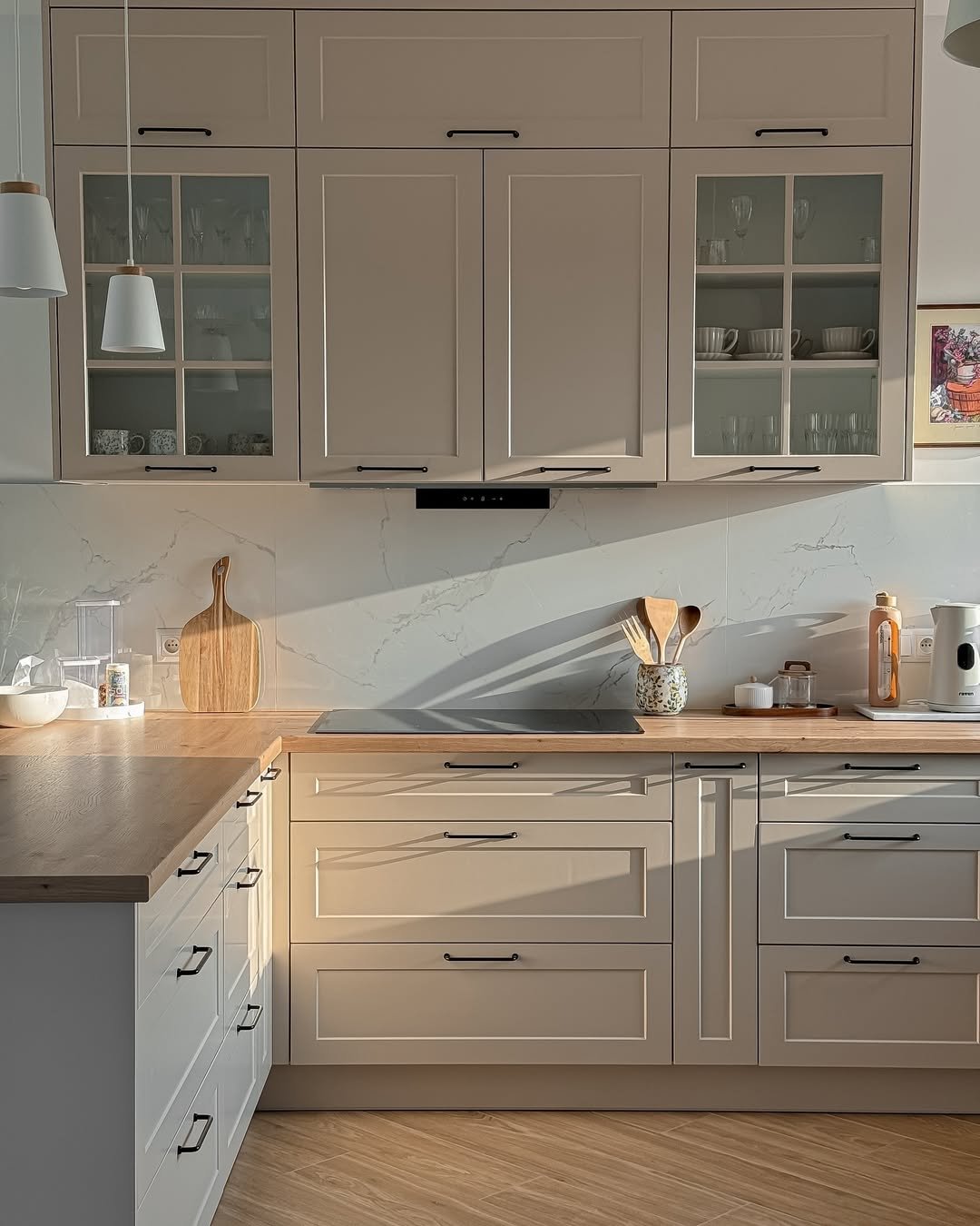 Warm Beige Shaker Cabinets with Glass and Marble
