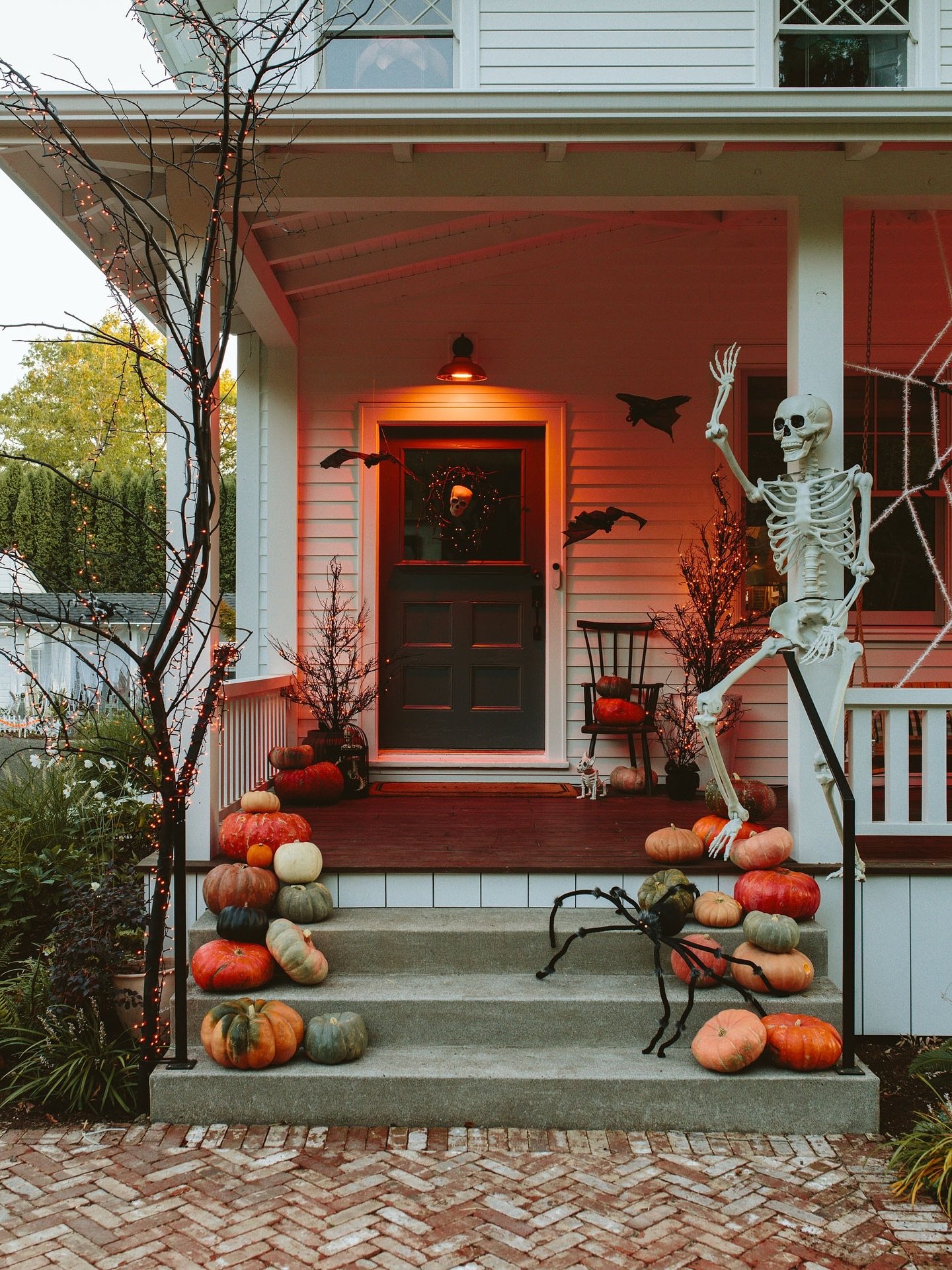 Warm Porch Light and Full Size Skeleton