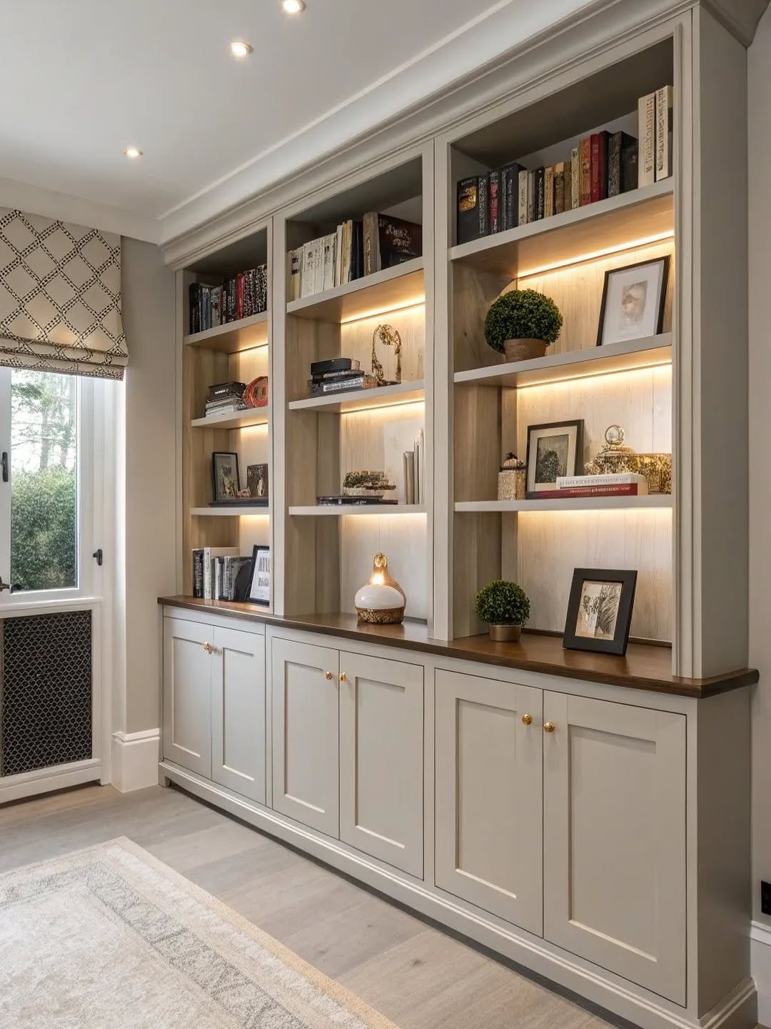 White Built-Ins with Brass Picture Light