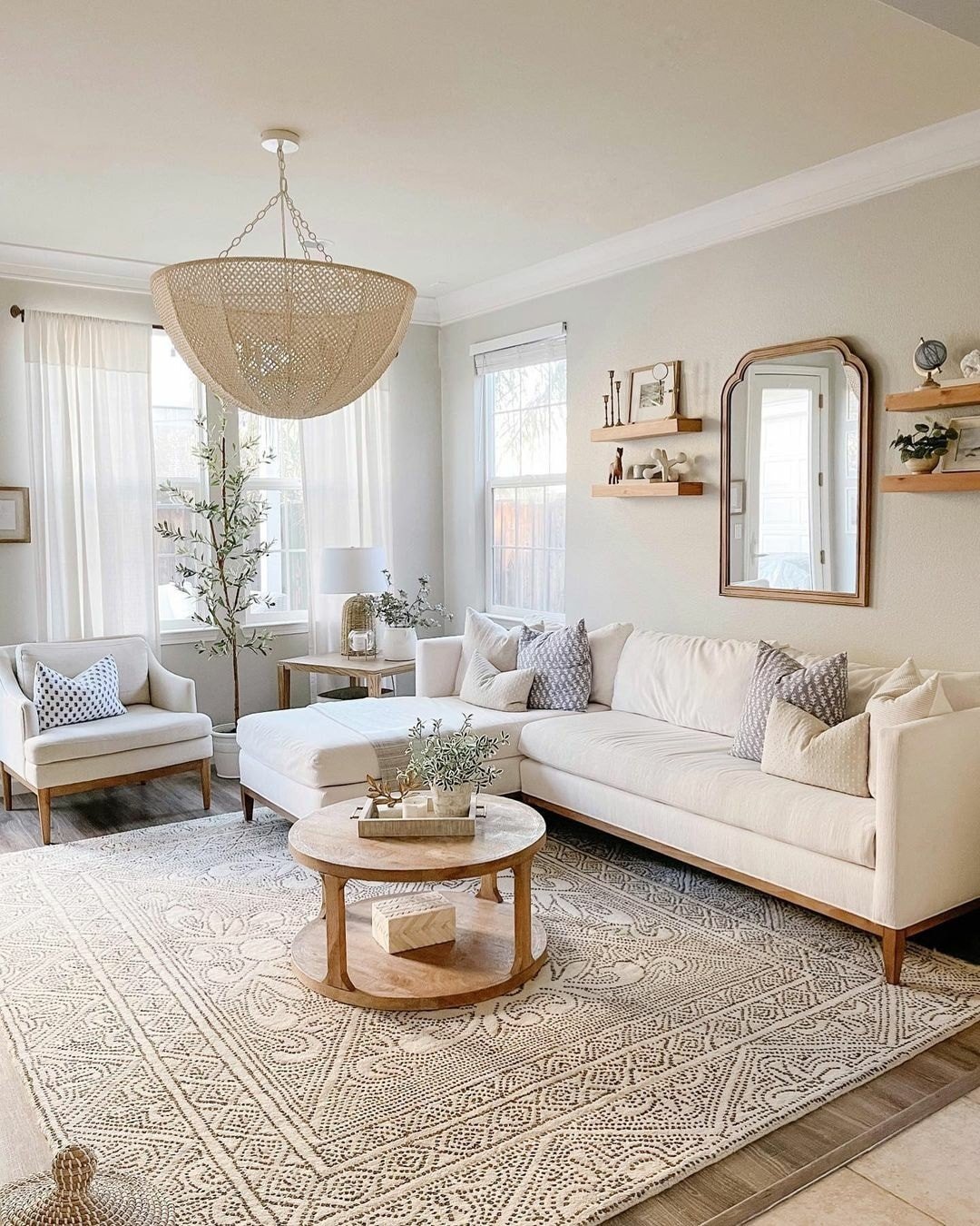 White Sectional with a Rattan Pendant