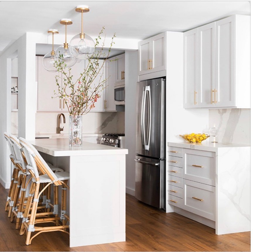 White Shaker Cabinets and Gold Pendants