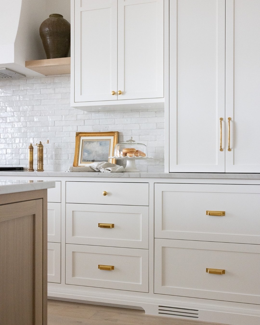 White Shaker Cabinets with Brass Hardware