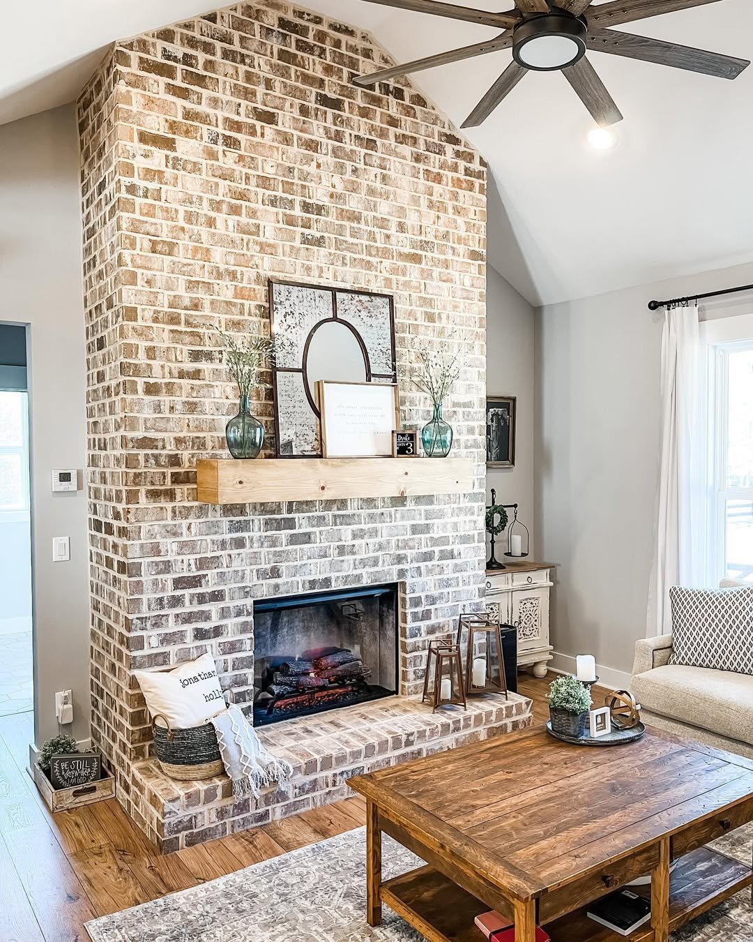 Whitewashed Cathedral Brick Fireplace